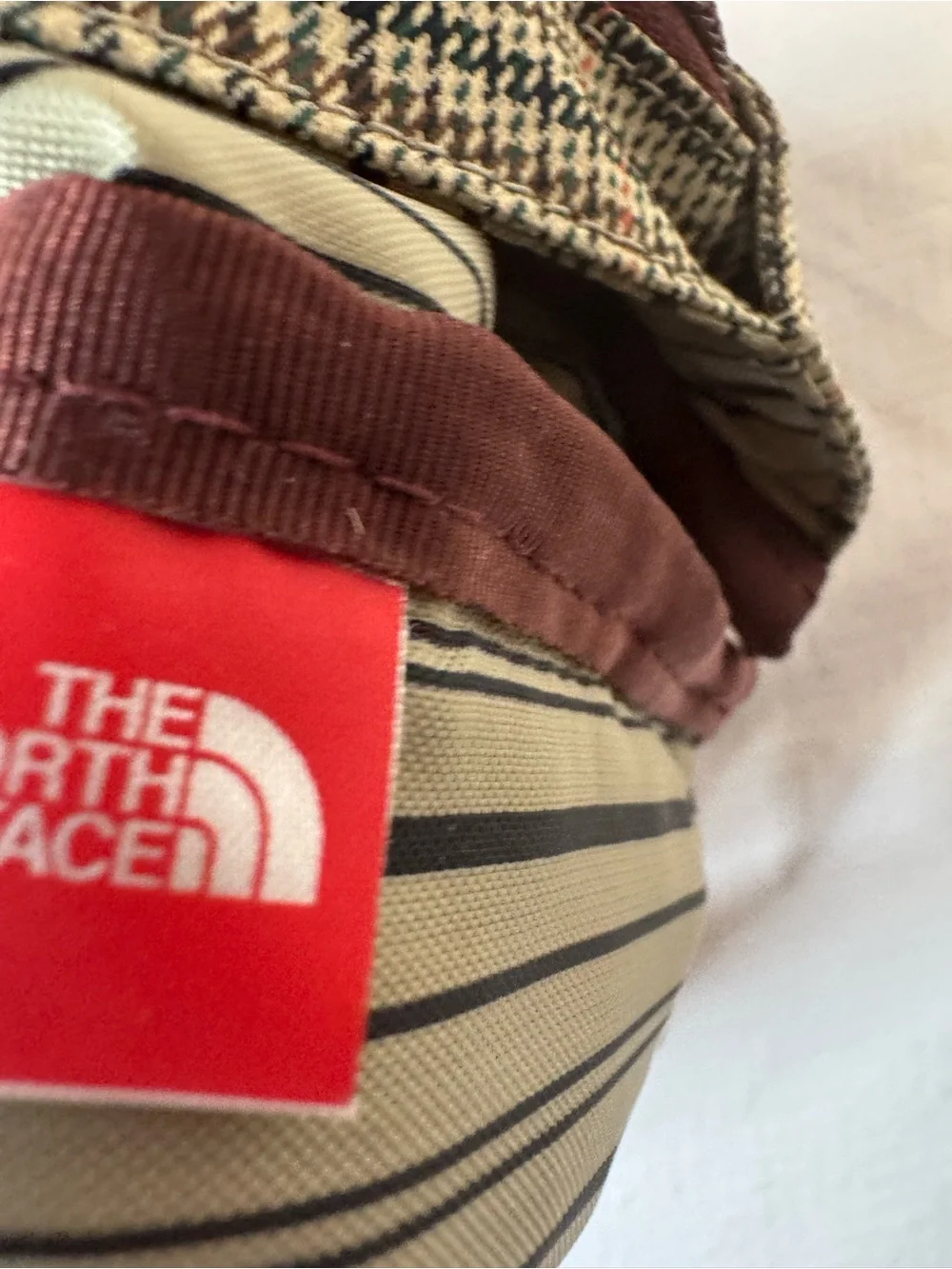 The North Face compact messenger